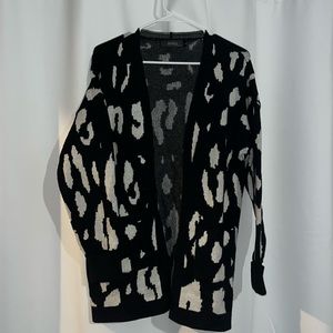 Long sleeve, sweater cardigan, animal print, size large.